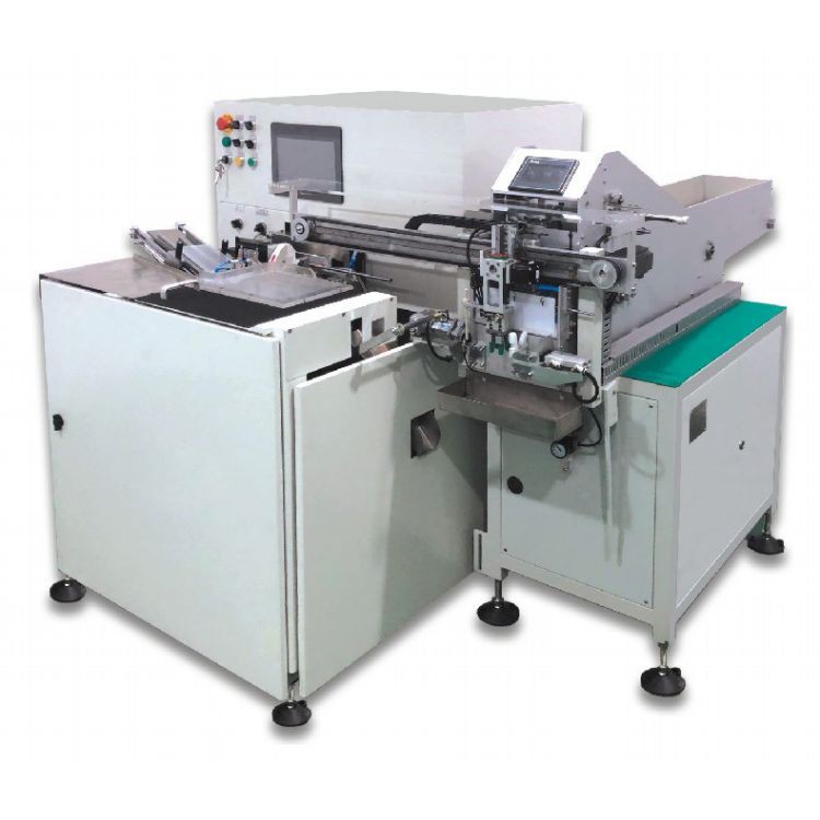 Toothbrush machine with trimming and endgrinding Toothbrush machine with trimming and endgrinding